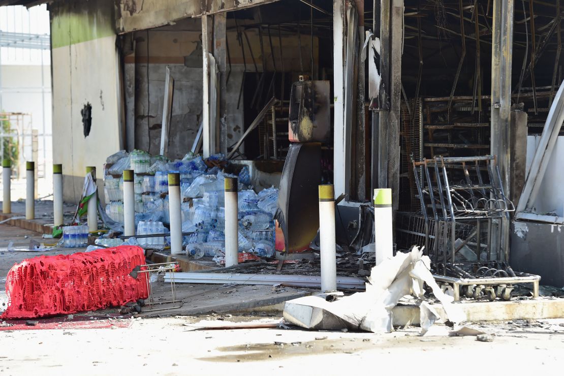 Convenience stores damaged after an attack in Cho-airong district in southern Thailand's Narathiwat province on August 17.