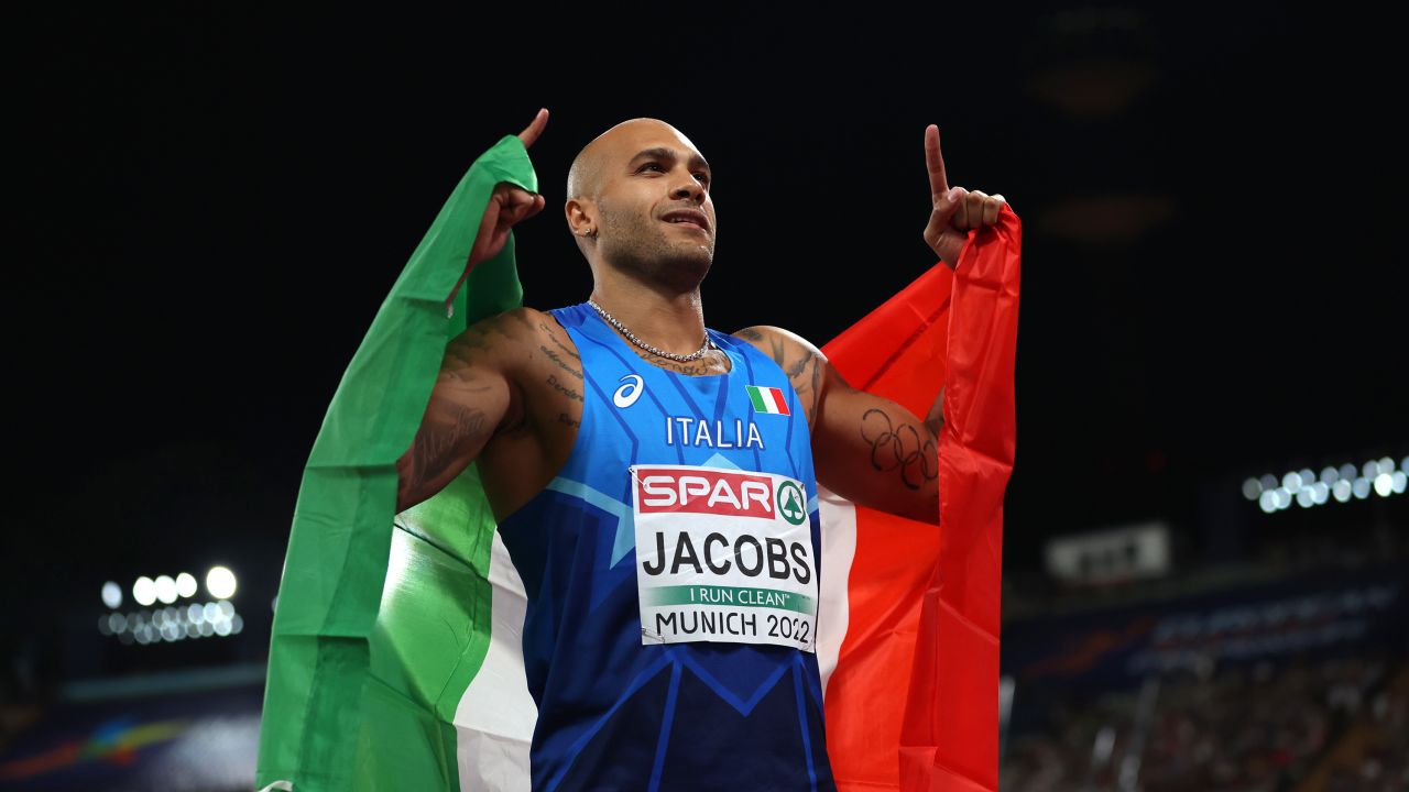Lamont Marcell Jacobs celebrates after winning the men's 100m final at the 2022 European Championships.