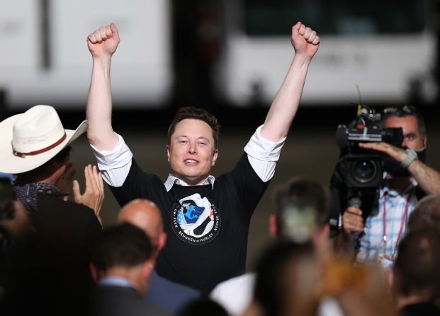 Musk celebrates after the <a href="index.php?page=&url=https%3A%2F%2Fwww.cnn.com%2F2020%2F05%2F27%2Fus%2Fgallery%2Fspacex-nasa-launch%2Findex.html" target="_blank">successful launch</a> of the SpaceX Falcon 9 rocket carrying the manned Crew Dragon spacecraft at Kennedy Space Center in Florida in May 2020. It marked the first time in history that a commercial aerospace company carried humans into Earth's orbit.