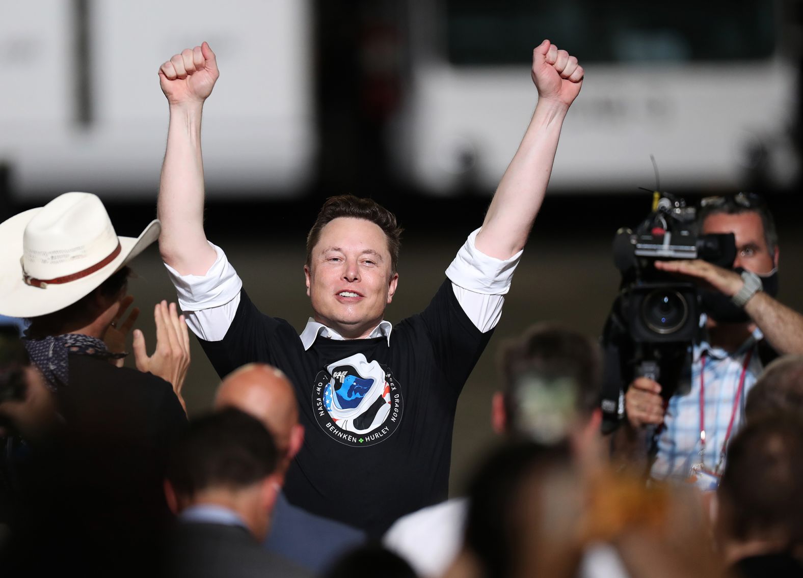 Musk celebrates after the <a href="https://www.cnn.com/2020/05/27/us/gallery/spacex-nasa-launch/index.html" target="_blank">successful launch</a> of the SpaceX Falcon 9 rocket carrying the manned Crew Dragon spacecraft at Kennedy Space Center in Florida in May 2020. It marked the first time in history that a commercial aerospace company carried humans into Earth's orbit.