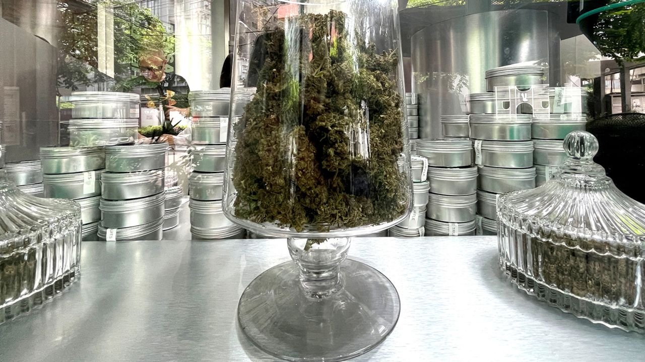 A jar with cannabis is seen in a dispensary shop in Bangkok, Thailand on August 17, 2022. 