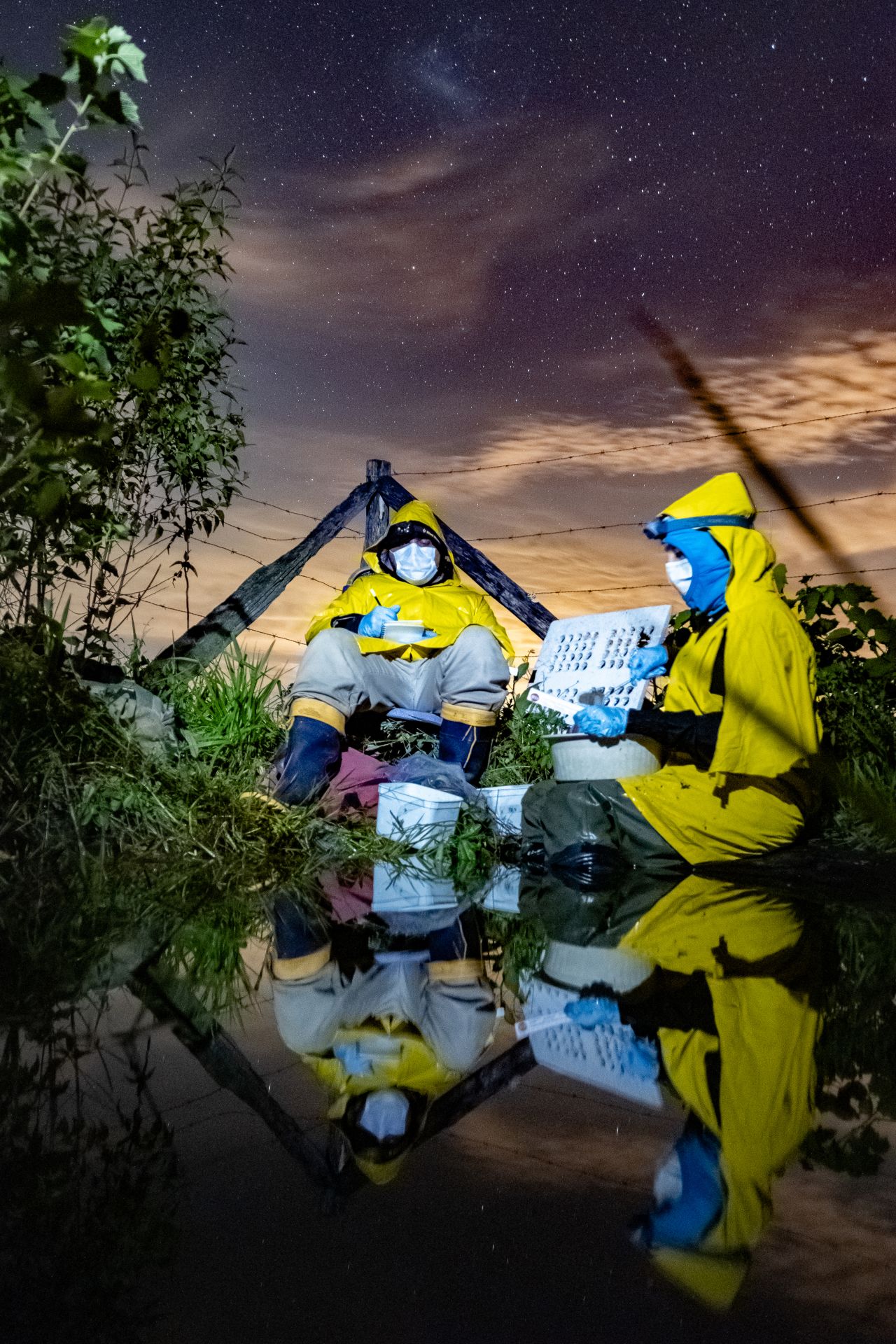 Researchers perform fieldwork during thunderstorms in the Covid-19 pandemic. 