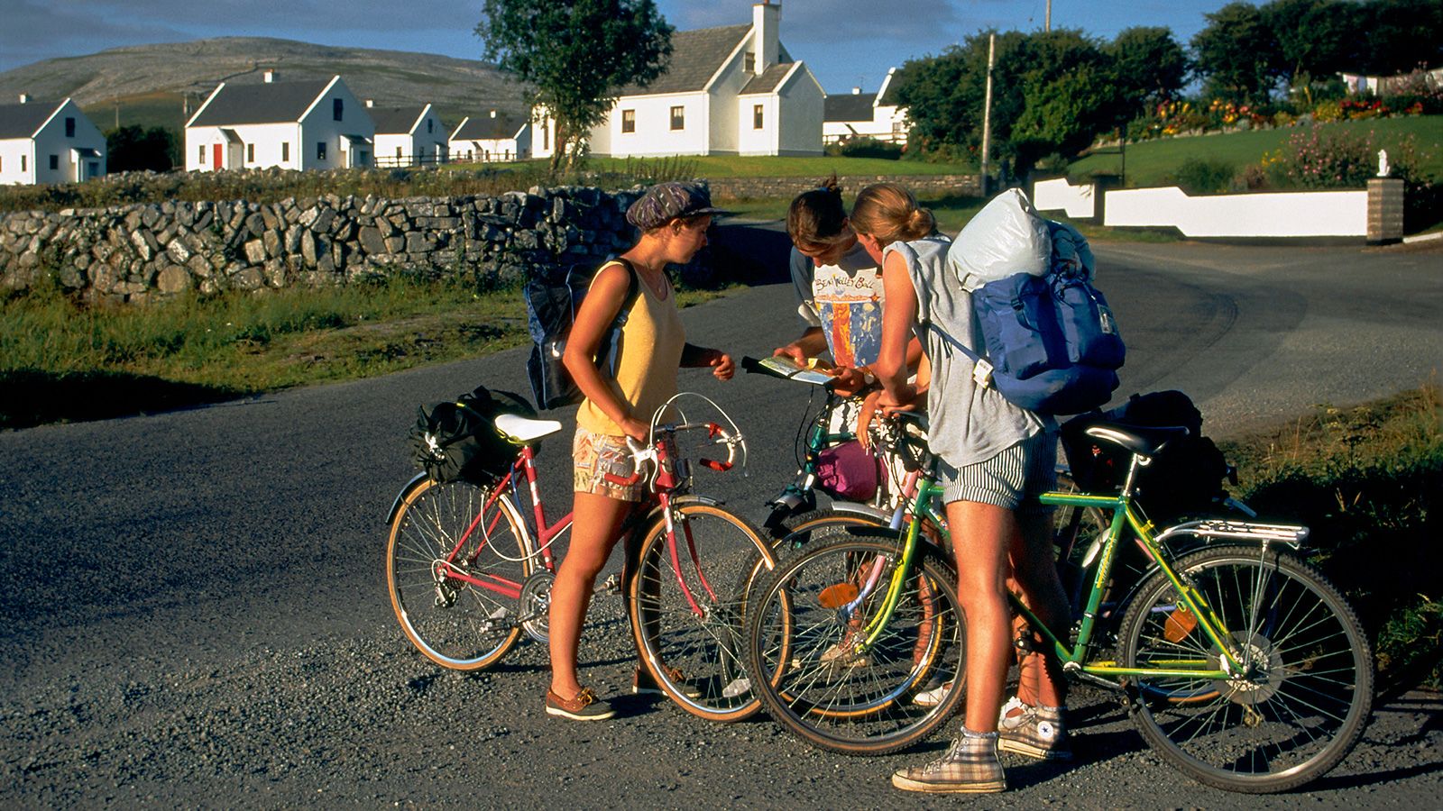 <strong>Go west:</strong> Cyclists huddle as they work out their directions in County Clare in the west of Ireland. 