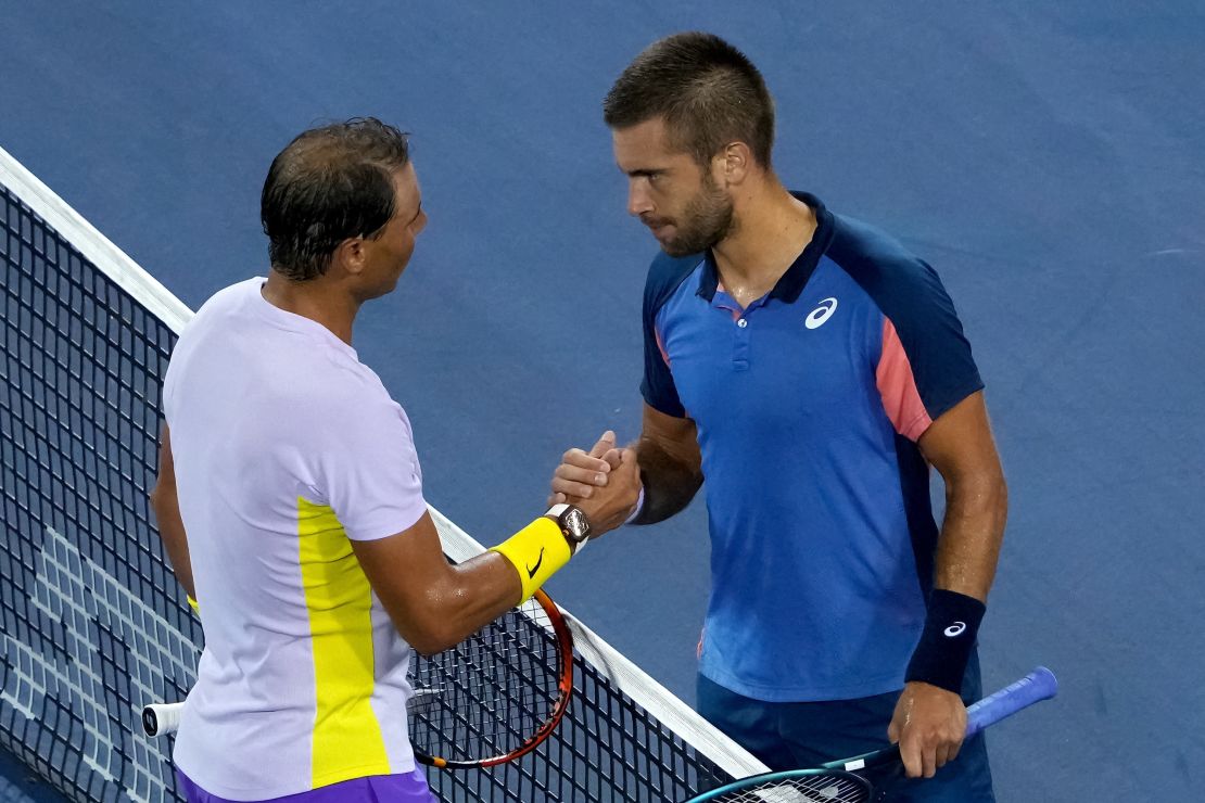 Nadal and Ćorić shake hands after their match in Cincinnati. 