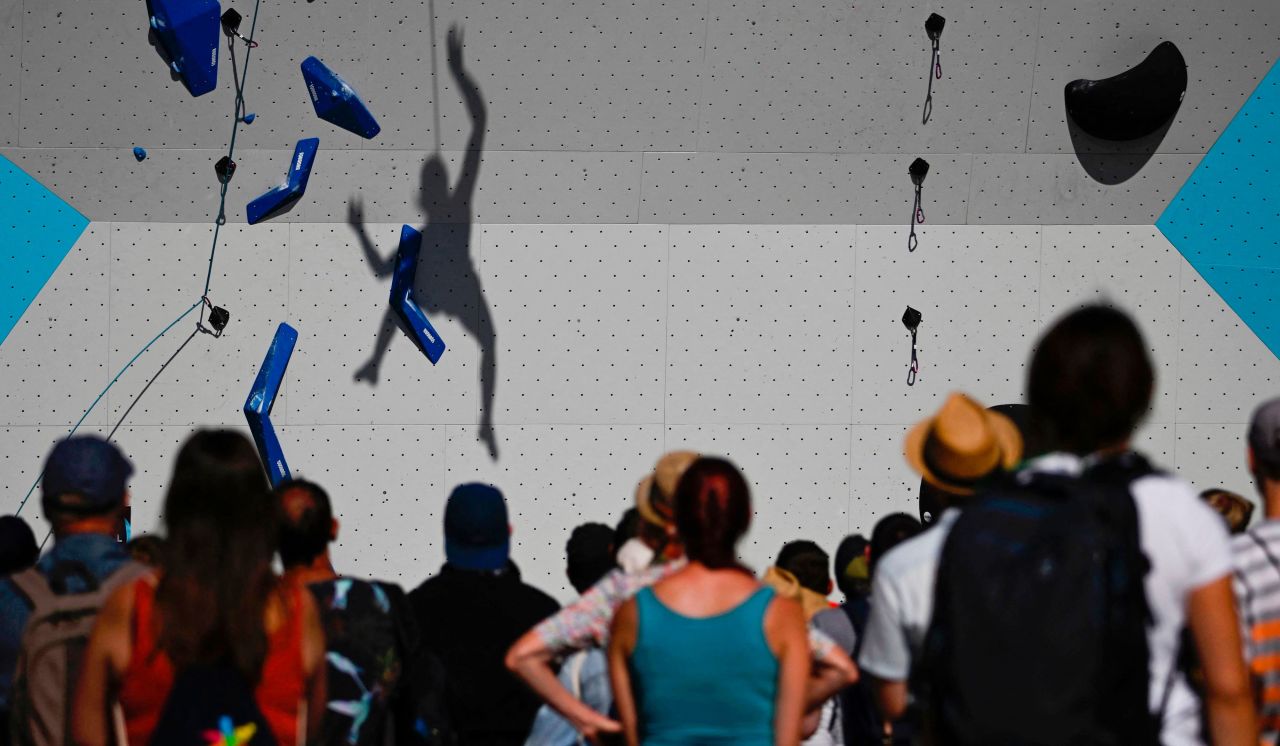 The shadow of a climber is seen on the wall during the women's lead sport climbing semi-final at the European Championships in Munich, Germany, on Saturday, August 13.