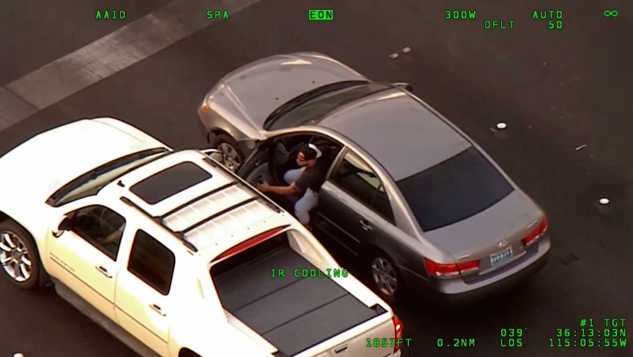 Video captures carjacking suspect crashing head-on into a police car