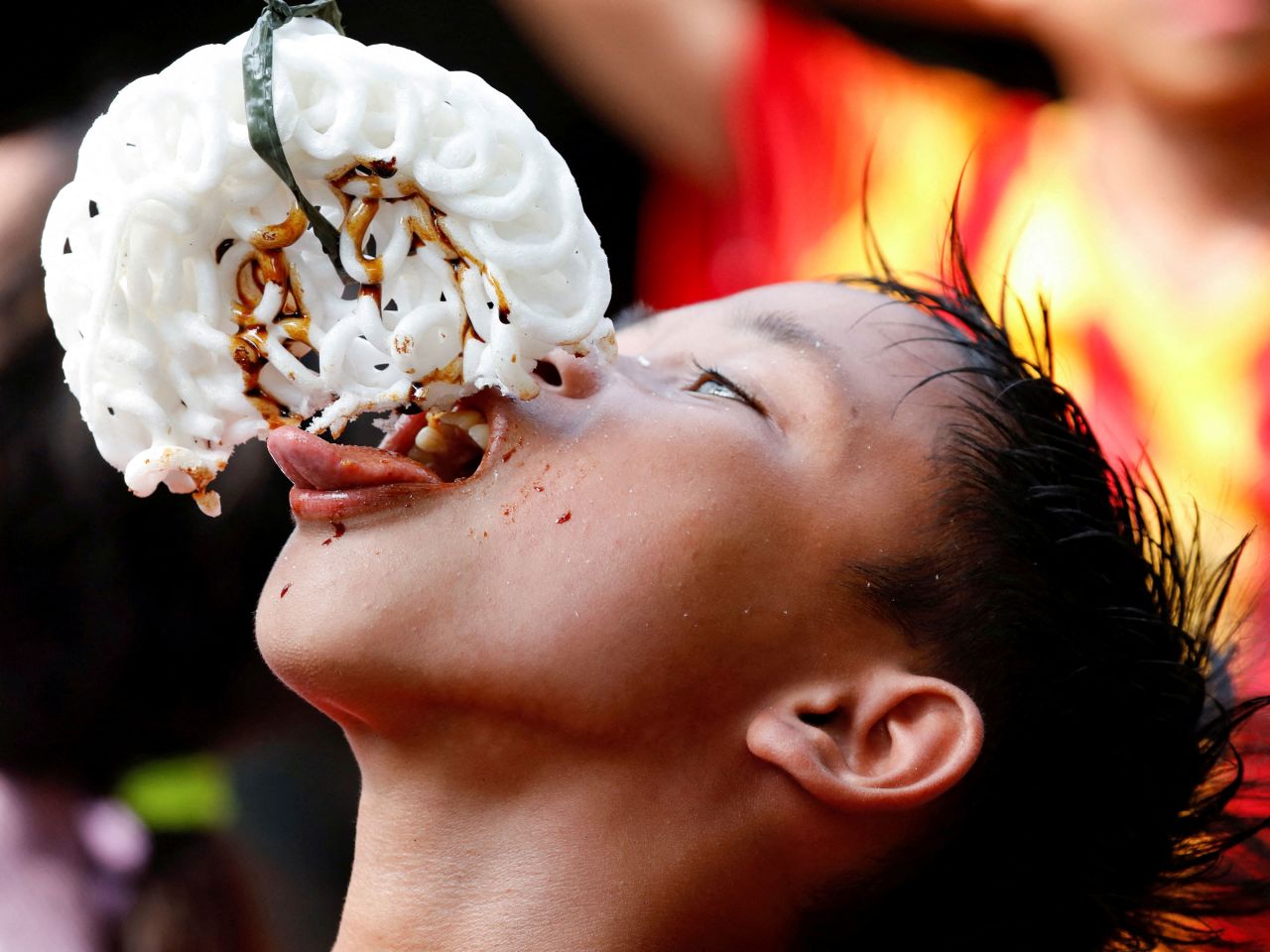 A boy takes part in a competition during Independence Day celebrations in Jakarta, Indonesia, on Wednesday, August 17.