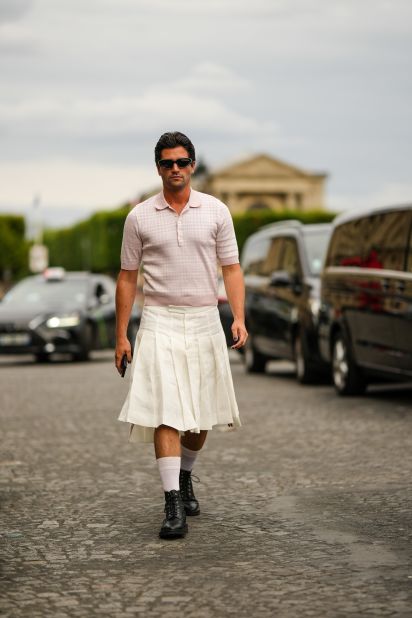 Stylist Marc Forne wearing a skirt to a Thom Browne show at Paris Fashion Week in 2022.