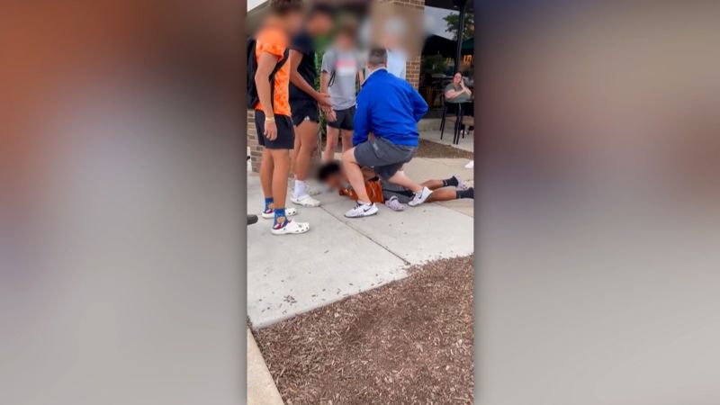 Judge acquits off-duty Chicago cop seen in video kneeling on teen's back, attorneys say