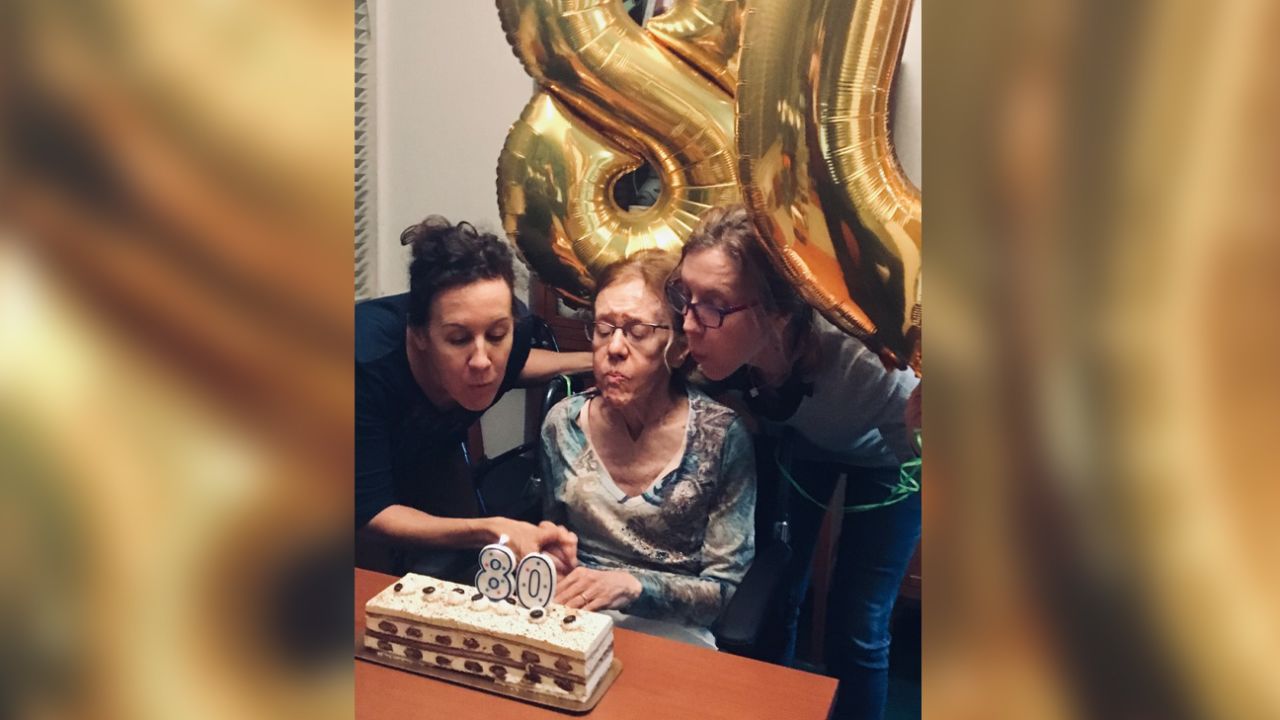 My sister (right) and I help my mother celebrate her 80th birthday, 2019.