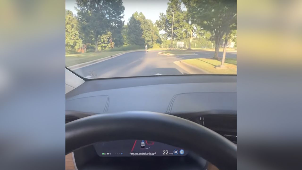 Carmine Cupani and his 11-year-old son performed a test to see if Tesla's "full self-driving" would stop for a child in the road (Cupani's son is seen here in the distance).