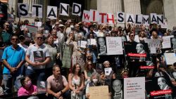 Writers gather to read selected works of British author Salman Rushdie, one week after he was stabbed while on stage, during a rally to show solidarity for free expression outside the New York Public Library in New York City on August 19, 2022. - Hadi Matar has pleaded not guilty to attempted murder charges after being accused of stabbing British author Salman Rushdie multiple times on stage during a literary event at the Chautauqua Institution. The severely injured author is recovering well according to family and friends, after the assault left him with multiple stab wounds on August 12, 2022. (Photo by TIMOTHY A. CLARY / AFP) (Photo by TIMOTHY A. CLARY/AFP via Getty Images)
