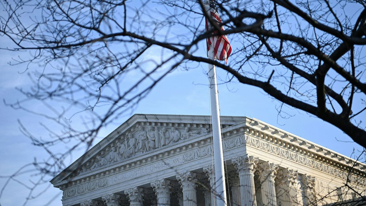 Biden administration tells Supreme Court Title 42 will end when Covid