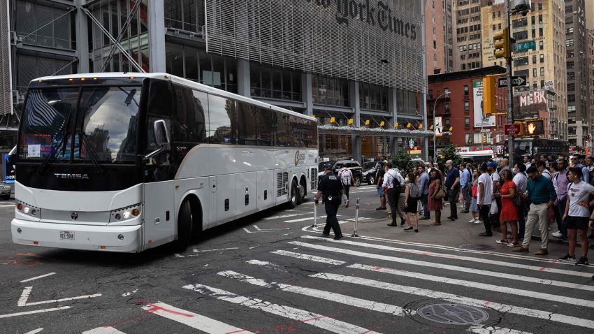 A bus carrying migrants from Texas arrives at Port Authority Bus Terminal on August 10, 2022 in New York. - Texas has sent thousands of migrants from the border state into Washington, DC, New York City, and other areas.