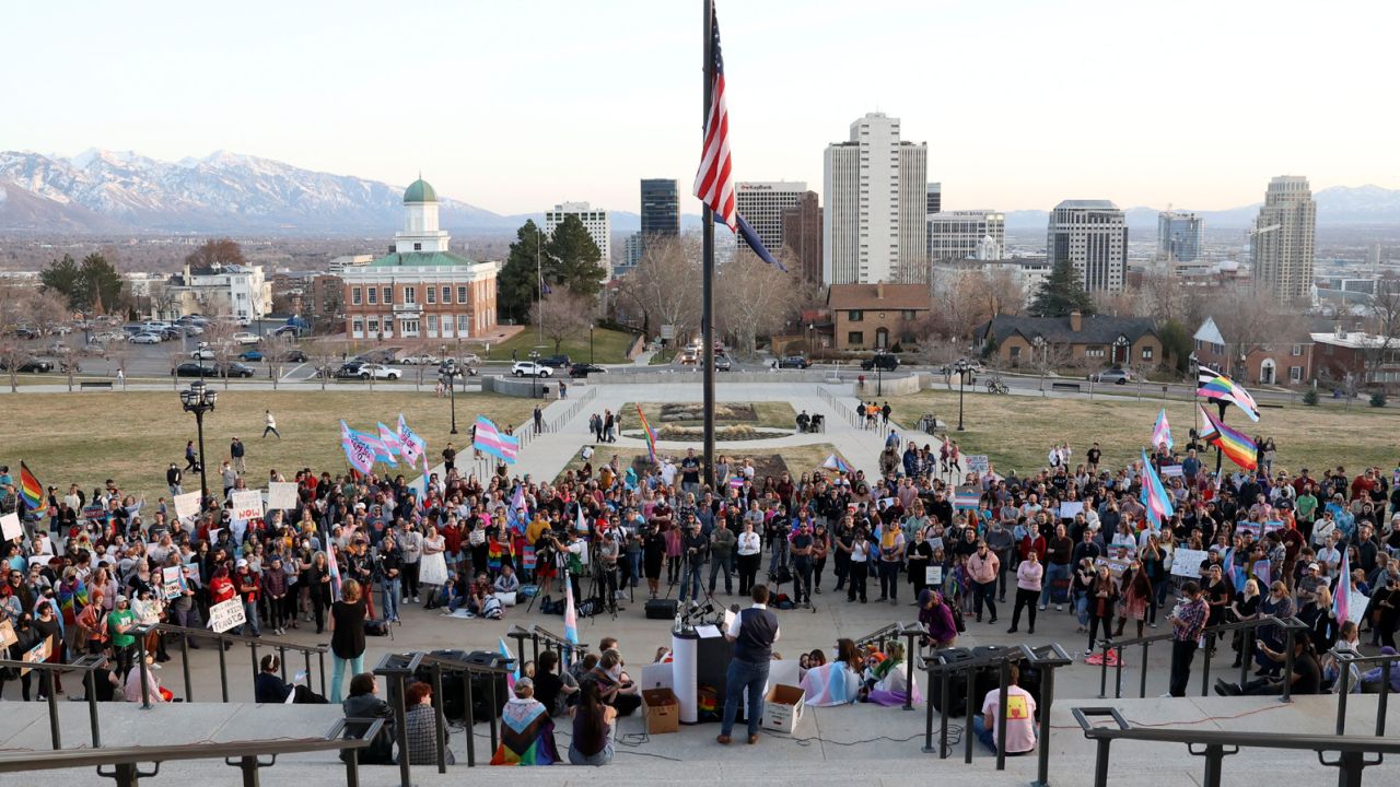 Peoples attend a rally to support transgender youths outside of the Capitol in Salt Lake City, Thursday, March 24, 2022.