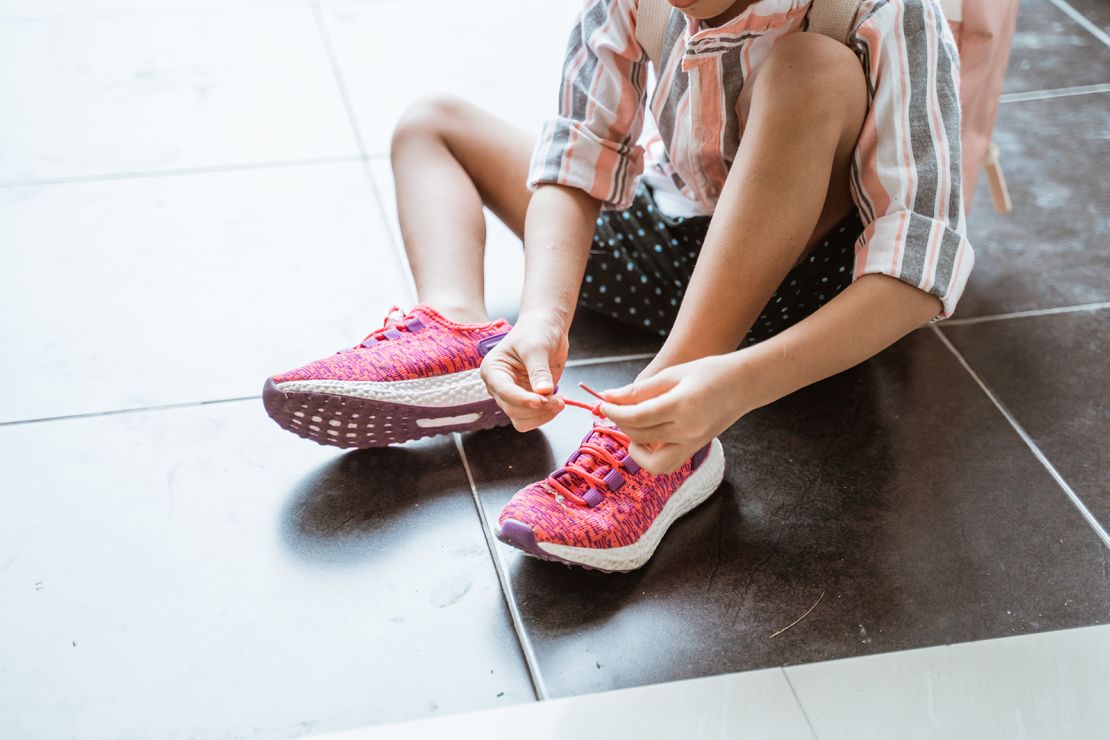 Encouraging children to tie their own shoes offers them the opportunity to take ownership of a helpful life skill.