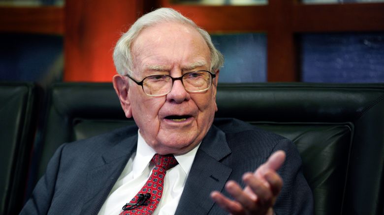 In this May 7, 2018 file photo, Berkshire Hathaway Chairman and CEO Warren Buffett speaks during an interview in Omaha, Neb. The world's most expensive lunch will go on sale again this spring when Buffett auctions off a private meal to raise money for a California homeless charity one last time. Buffett held the online lunch auction once a year for 20 years before the pandemic began to raise money for the Glide Foundation, which helps the homeless in San Francisco.