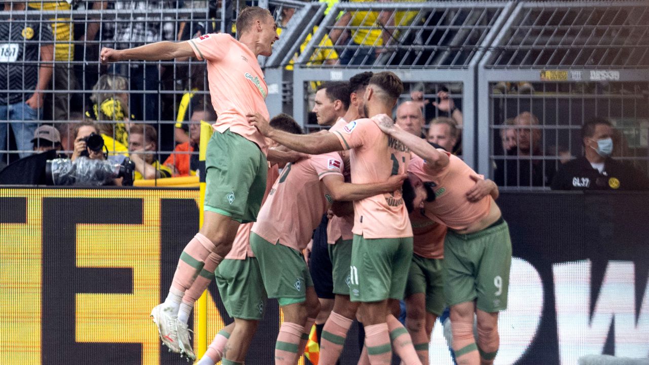 Werder Bremen players celebrate their side's 3-2 victory over Borussia Dortmund at Signal Iduna Park on Saturday. 
