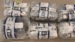 Officers detected nearly 60 kg of powdered substances hidden inside military-style ammunition boxes concealed within a three tonne lathe. (Australian Federal Police)