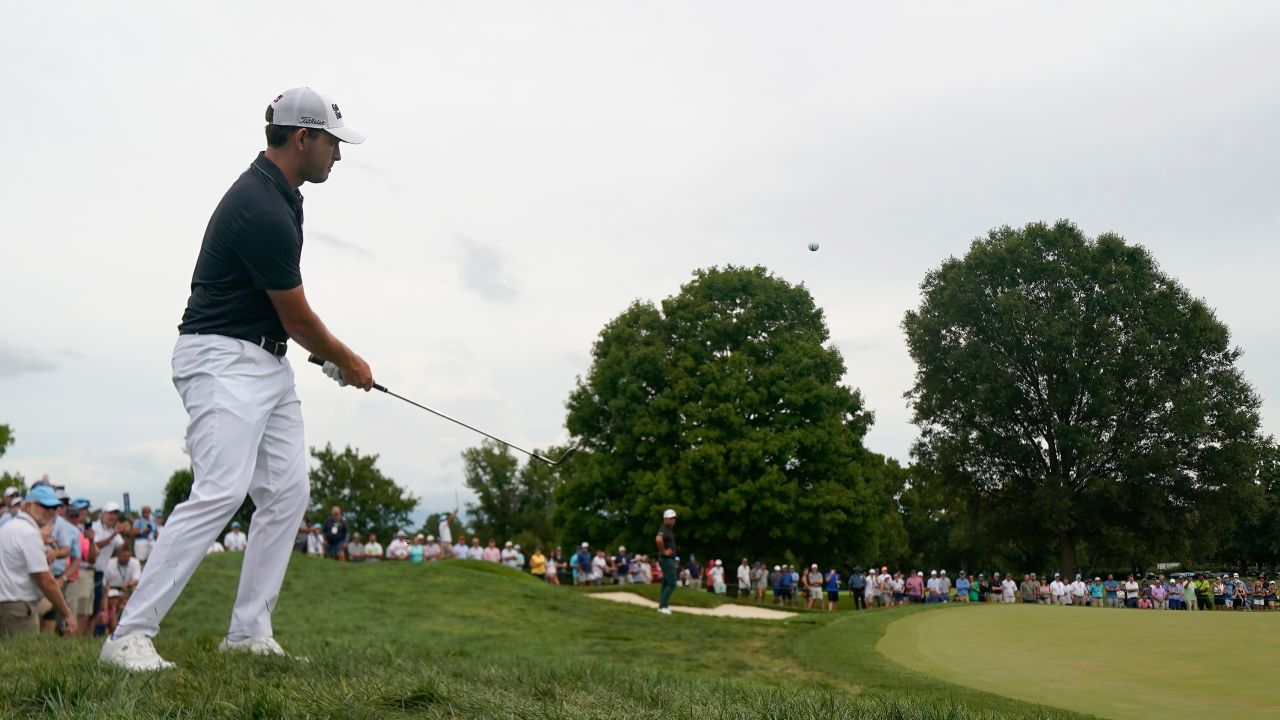 Cantlay hits toward the eighth green during the final round of the BMW Championship.