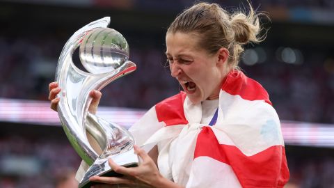 White poses with the trophy following England's victory in the Women's Euro 2022 final.