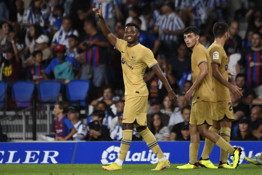 Fati celebrates scoring his team's fourth goal against Real Sociedad.