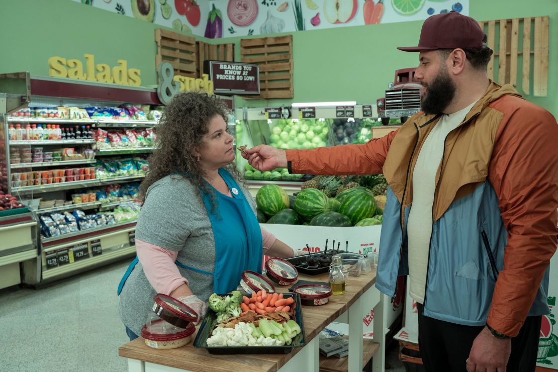 Mo's love of olive oil -- and hatred of strange hummus flavors -- is so strong that he pulls out his own bottle of olive oil to share at a grocery store sample table in the show's first episode.