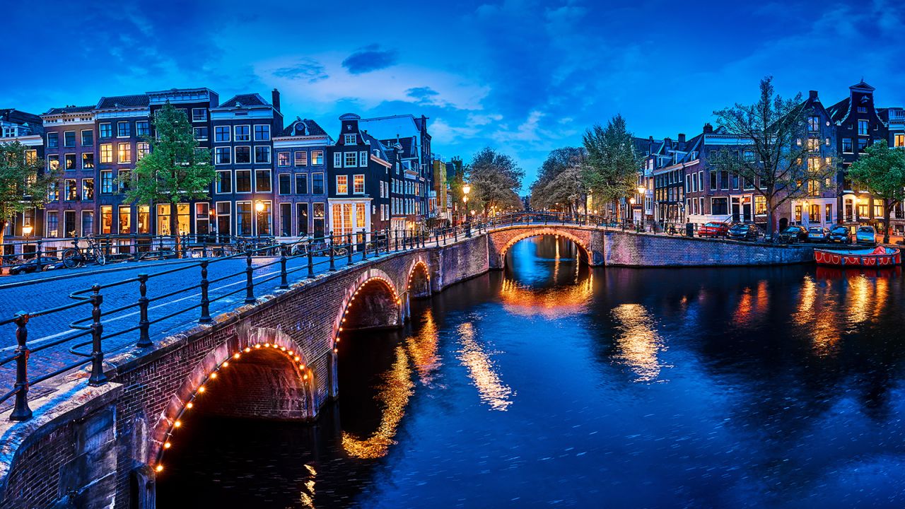 The bridges and canals of  Amsterdam are a favorite of tourists to the Netherlands, which is lodged at Level 3 along with much of Europe.