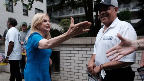 Rep. Carolyn Maloney, left, speaks to supporters on August 22, 2022, in New York City. 