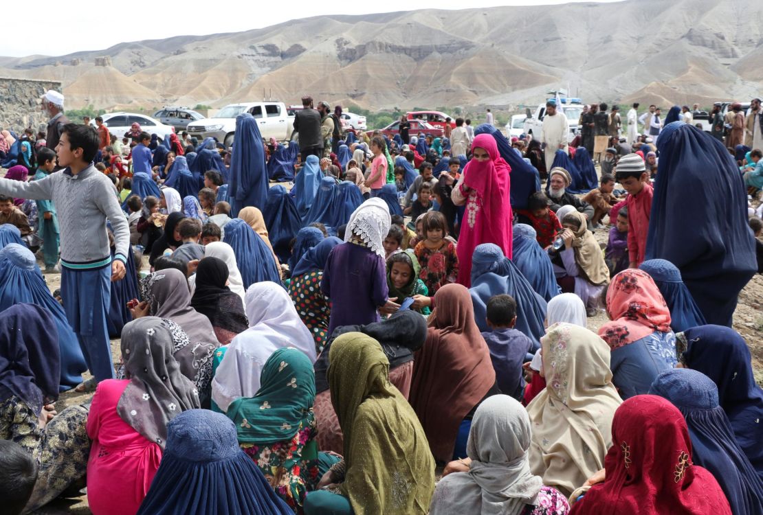 Displaced Afghan people after heavy flooding in the Khushi district of Logar, Afghanistan, on August 21, 2022.