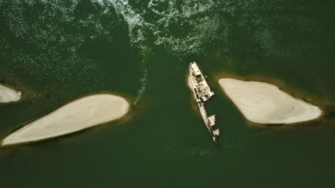 An aerial view of a World War II warship.