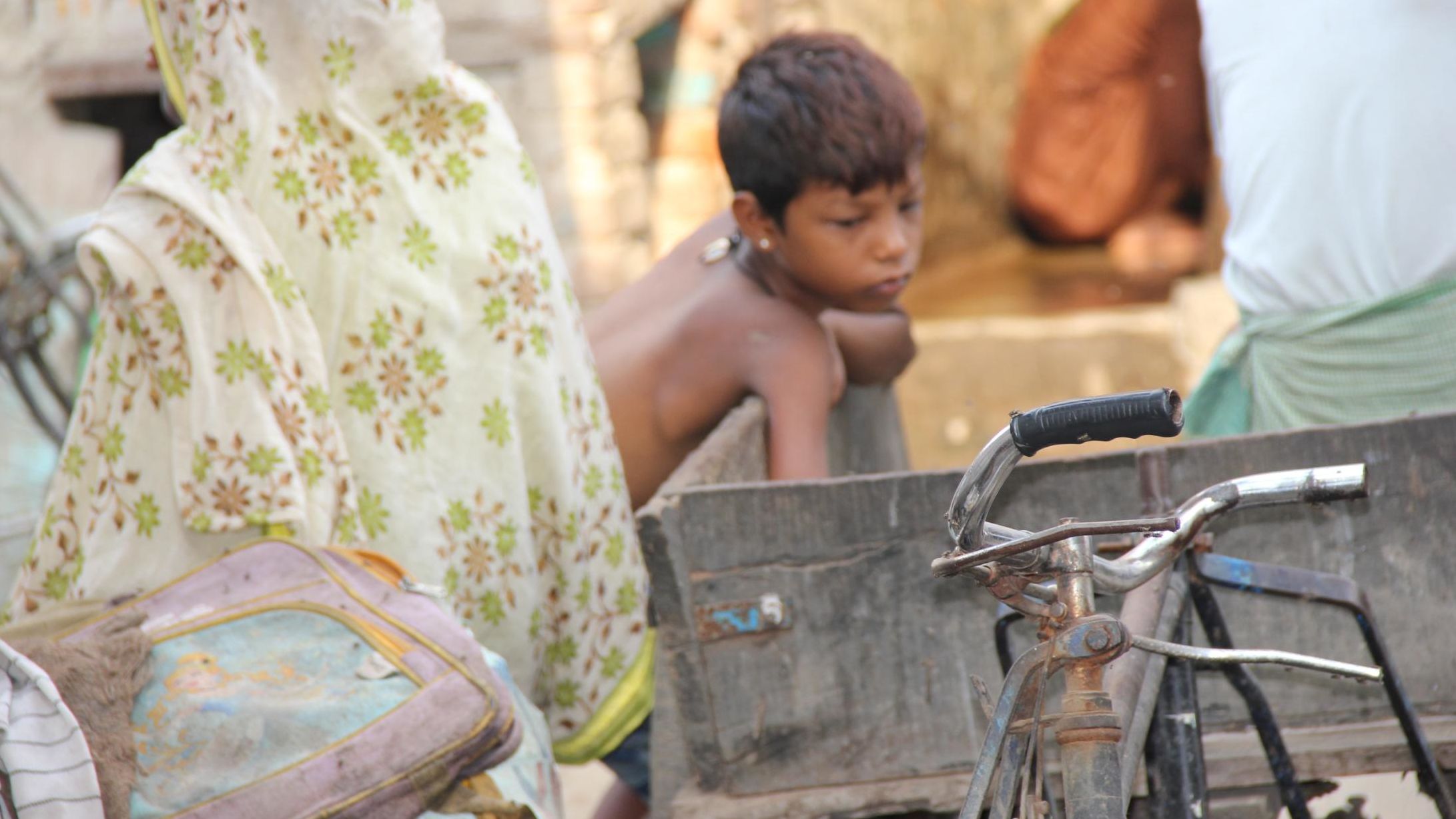 A young boy in the narrow lanes of slums in Bhalswa Dairy Village.