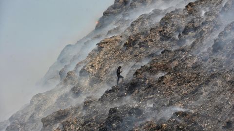 Ragpicker at the Bhalswa landfill site on April 28, 2022, in New Delhi, India. 