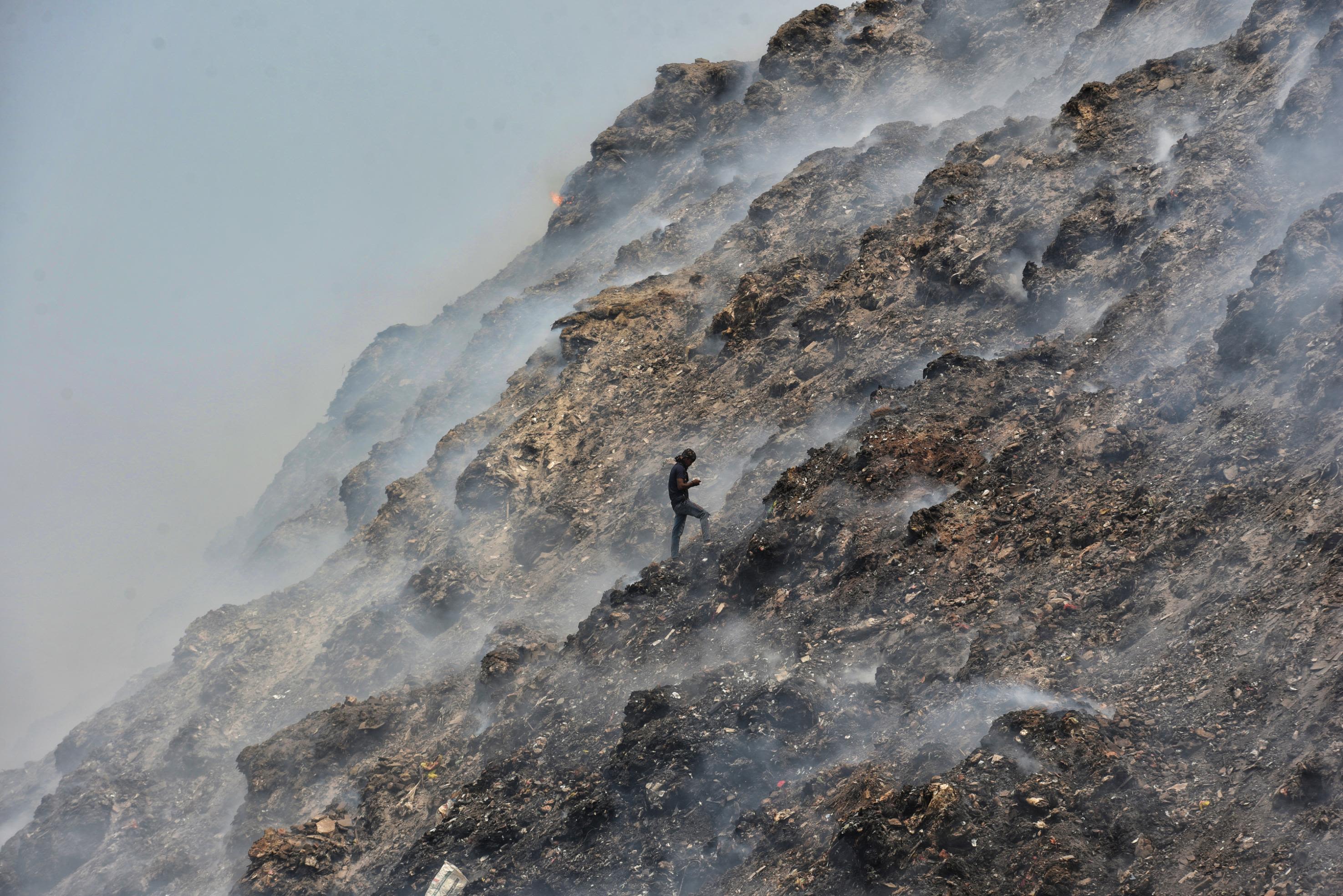 A trash heap 62 meters high shows the scale of India's climate