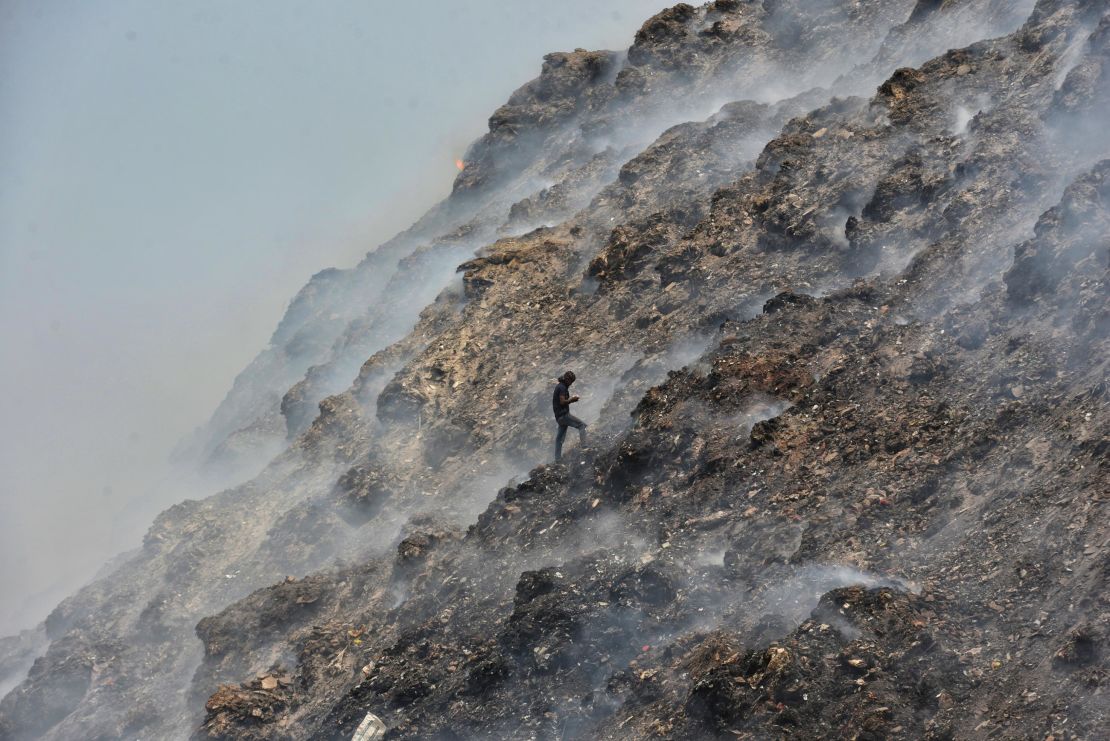 Ragpickers at the Bhalswa landfill site on April 28, 2022, in New Delhi, India. 