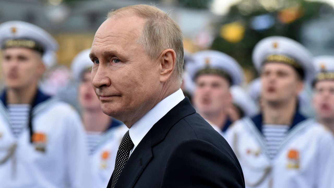 Russian President Vladimir Putin reviews troops at the parade for Russian Navy Day, in St. Petersburg on July 31, 2022.