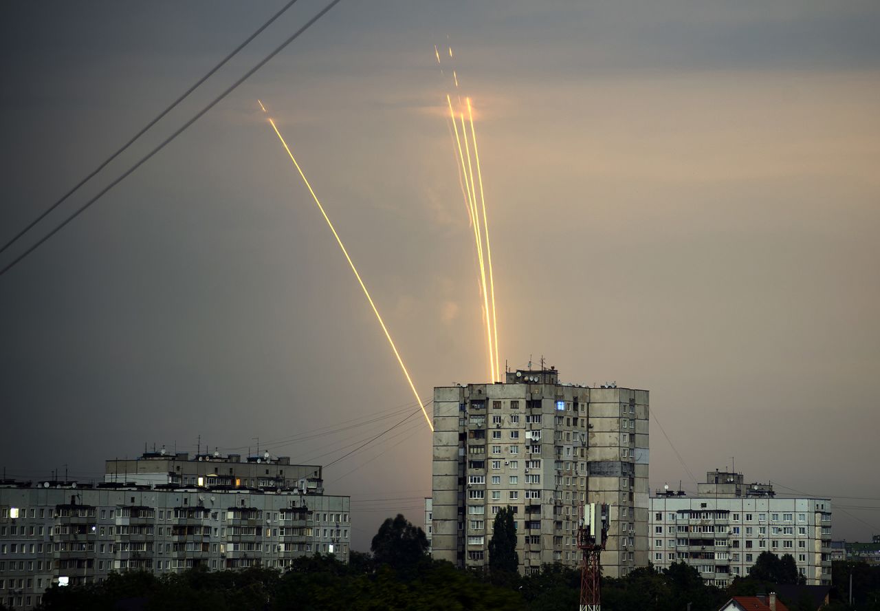 Rockets launched from the Belgorod region in Russia are seen at dawn in Kharkiv, Ukraine, on August 15.
