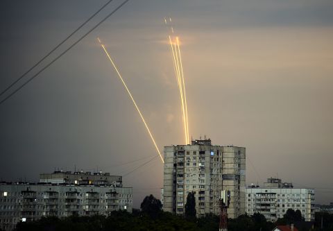 Rockets launched from the Belgorod region in Russia are seen at dawn in Kharkiv, Ukraine, on August 15.