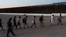 Asylum seeking migrants are transported by US Customs and Border Protection agents, after crossing the Rio Grande River into the US on July 26, 2022. 