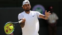 LONDON, ENGLAND - JULY 10: Nick Kyrgios of Australia plays a forehand against Novak Djokovic of Serbia during their Men's Singles Final match on day fourteen of The Championships Wimbledon 2022 at All England Lawn Tennis and Croquet Club on July 10, 2022 in London, England. (Photo by Clive Brunskill/Getty Images)
