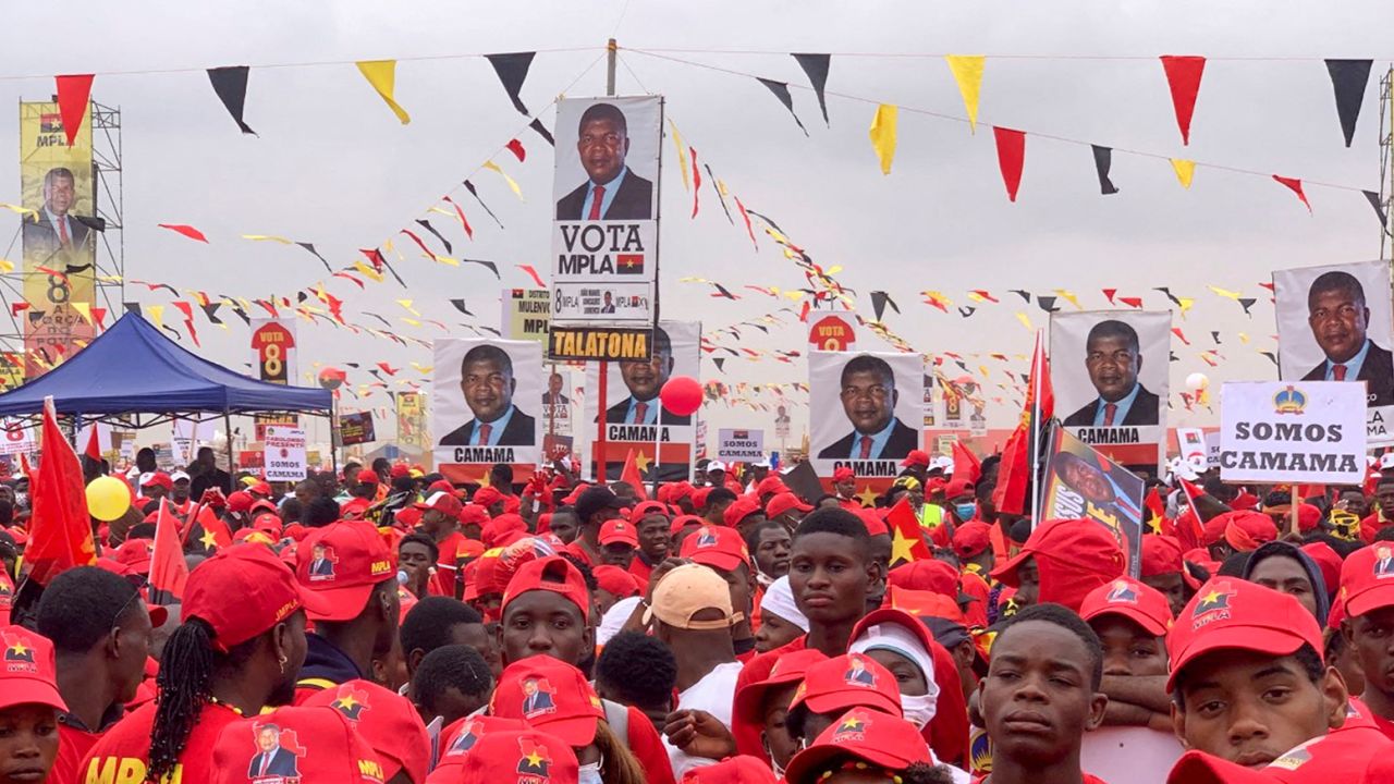Supporters of Angola's President and leader of the ruling MPLA Joao Lourenco attend their party's final rally in Camama, on the outskirts of the capital Luanda, in Angola, on August 20, 2022. 