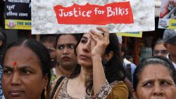 MUMBAI, MAHARASHTRA, INDIA - 2022/08/23: A protester holds a placard reading "Justice for Bilkis" during the demonstration. Protesters condemn government's decision to release all the11 convicts under government's remission policy, convicts who were earlier sentenced to lifetime imprisonment for the gang rape of the Muslim woman and killing 7 members of her family during communal riots in 2002. (Photo by Ashish Vaishnav/SOPA Images/LightRocket via Getty Images)