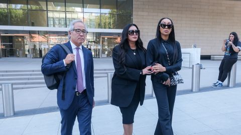 Vanessa Bryant, center, and the singer Monica, right, leave the Federal Court Tuesday.