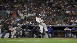 NEW YORK, NEW YORK - AUGUST 23:  Aaron Judge #99 of the New York Yankees connects on his seventh inning RBI base hit against the New York Mets at Yankee Stadium on August 23, 2022 in New York City. (Photo by Jim McIsaac/Getty Images)