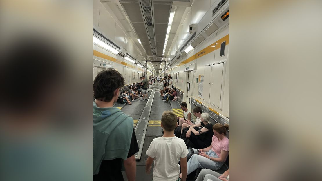 Passengers packed into a bus carriage on the Eurotunnel.