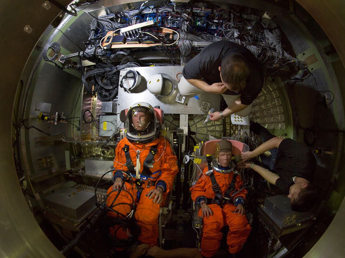 Dummies were in place for drop tests in new seats to simulate the Orion spacecraft's environment.