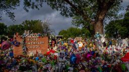 A memorial dedicated to the 19 children and two adults killed May 24 in the mass shooting at Robb Elementary is seen in June in Uvalde, Texas.
