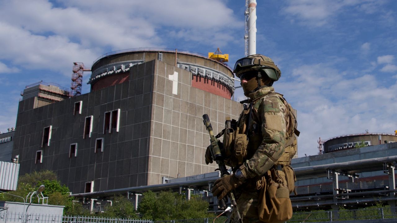 TOPSHOT - A Russian serviceman patrols the territory of the Zaporizhzhia Nuclear Power Station in Energodar on May 1, 2022. - The Zaporizhzhia Nuclear Power Station in southeastern Ukraine is the largest nuclear power plant in Europe and among the 10 largest in the world. 
 *EDITOR'S NOTE: This picture was taken during a media trip organised by the Russian army.* (Photo by Andrey BORODULIN / AFP) (Photo by ANDREY BORODULIN/AFP via Getty Images)