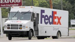 A FedEx Ground package van pulls into a business driveway in this north Jackson, Miss., facility, Tuesday, June 25, 2019. 