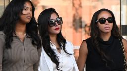 Vanessa Bryant (C), wife of the late Los Angeles Lakers basketball player Kobe Bryant, her daughter Natalia Bryant (L), and close friend Sydney Leroux (R) depart the court house in Los Angeles, California, on August 24, 2022, after a verdict was reached in Bryant's federal negligence lawsuit against Los Angeles County. - A jury ordered Los Angeles County to pay $31 million in damages Wednesday over graphic photos taken by sheriff's deputies and firefighters of the helicopter crash that killed basketball star Kobe Bryant. (Photo by Patrick T. FALLON / AFP) (Photo by PATRICK T. FALLON/AFP via Getty Images)